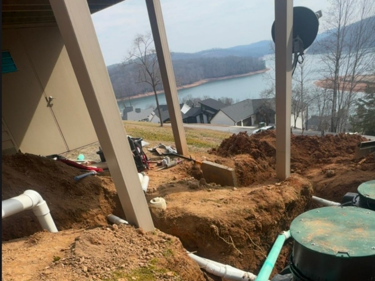 Septic system installation with tanks and piping at a Norris Lake property.