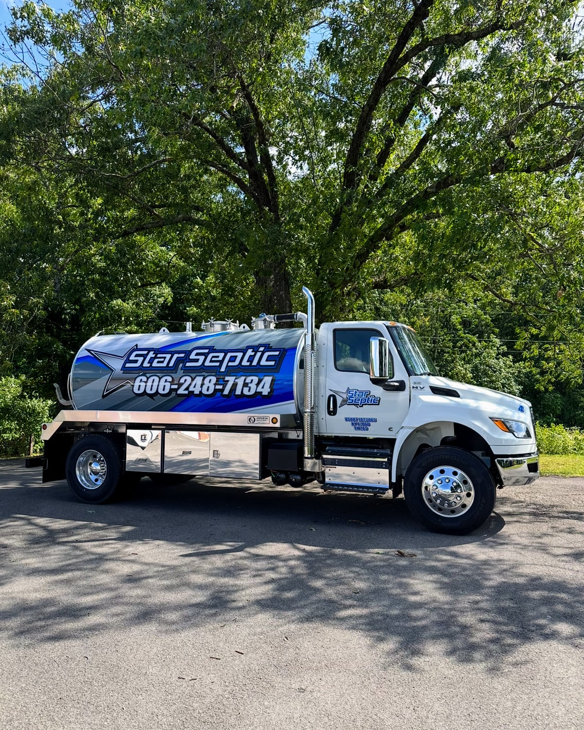 Star Septic pump truck used for septic pumping and cleaning service.