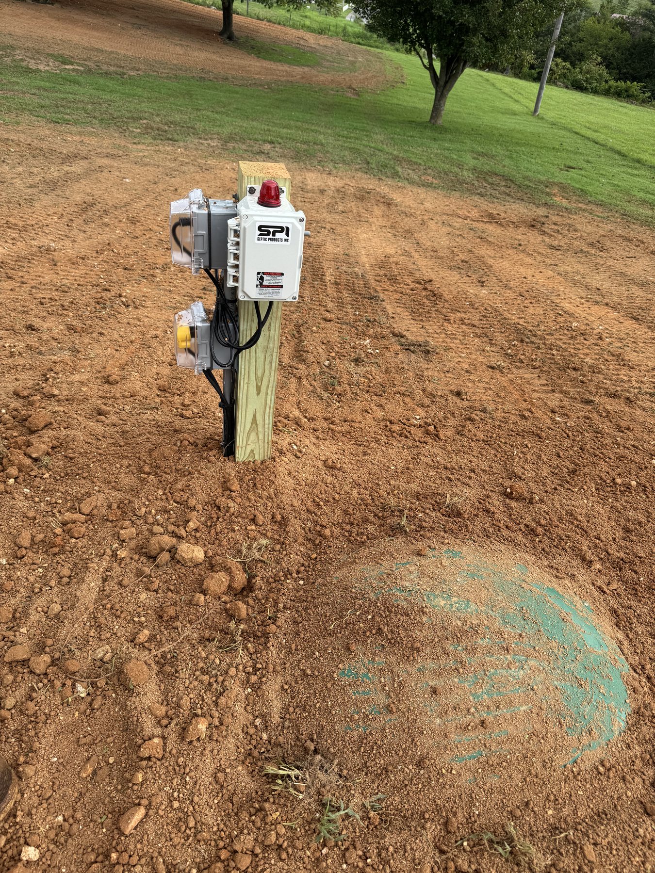 Septic control panel and pump system components installed in the field.